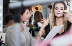 Woman getting makeup done picture