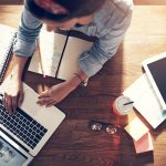Businesswoman working and typing laptop in office picture