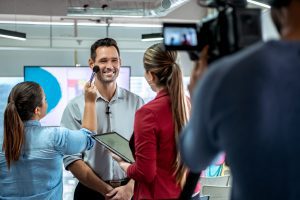 Camera Recording Video Of Businessman Corporate Interview And Makeup Artist picture