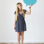 Happy Caucasian woman holding copyspace speech bubble
